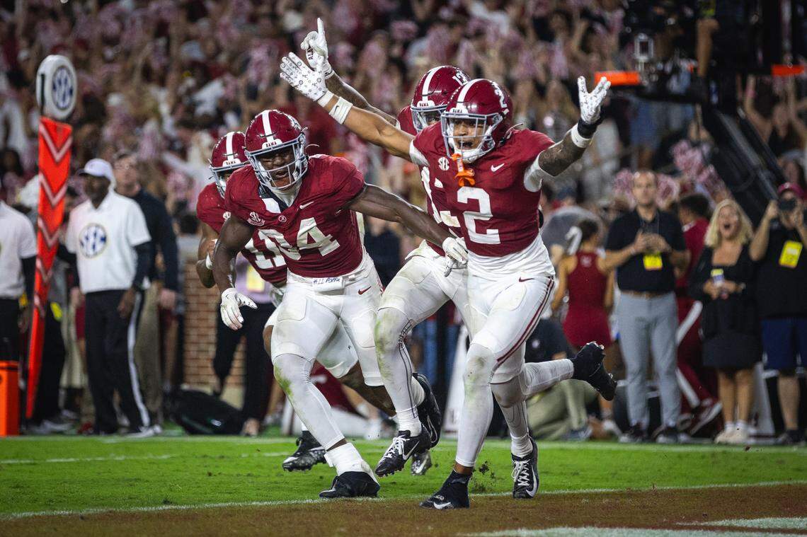 Sep 28, 2024; Tuscaloosa, Alabama, USA; Alabama Crimson Tide defensive back Zabien Brown (2) and linebacker Que Robinson (34) celebrate after an interception against the Georgia Bulldogs in the fourth quarter at Bryant-Denny Stadium.