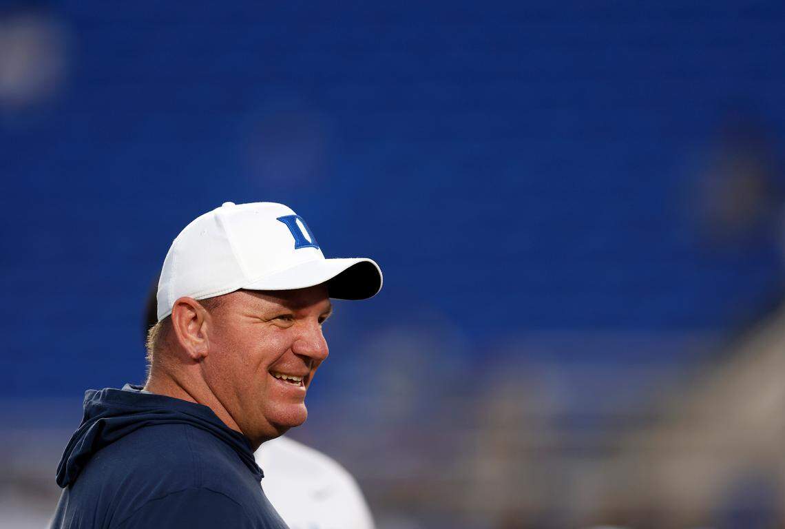 Duke head coach Mike Elko smiles as his team warms up prior to the Blue Devils’ spring football game on Friday, April 21, 2023, at Wallace Wade Stadium in Durham, N.C.