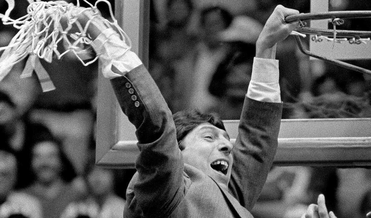NC State’s Jim Valvano celebrates after the Wolfpack defeated Houston to win the National championship on April 5, 1983.