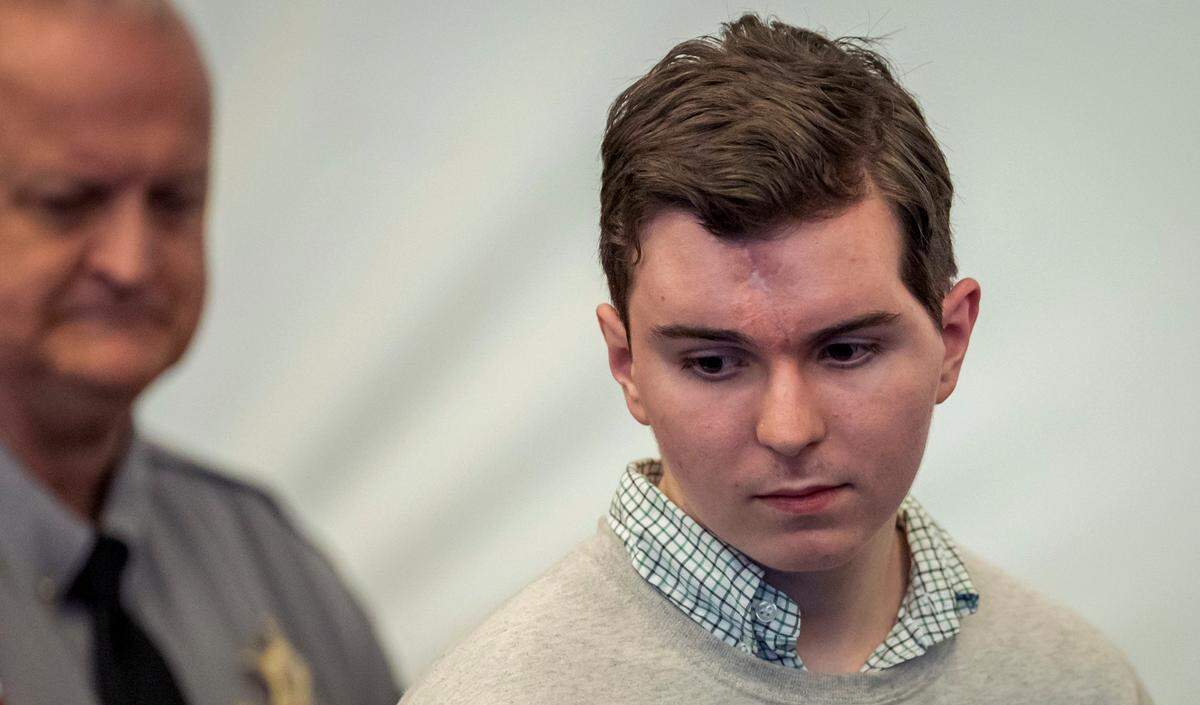 Austin Thompson arrives for his first court appearance on Friday, January 10, 2025 at the Wake County Justice Center in Raleigh, N.C. Thompson is accused in the deadly 2022 shootings in Raleigh’s Hedingham neighborhood.