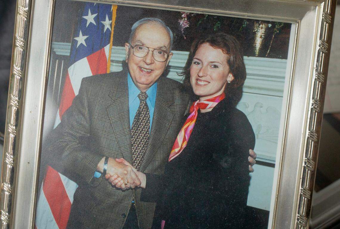 Kimrey Rhinehardt, right, a Republican for the last 28 years who changed her voter registration to unaffiliated following the Capitol riot on Jan. 6, is seen in this photo with former Sen. Jesse Helms, on Wednesday, Jan. 27, 2021, in Pittsboro, N.C.