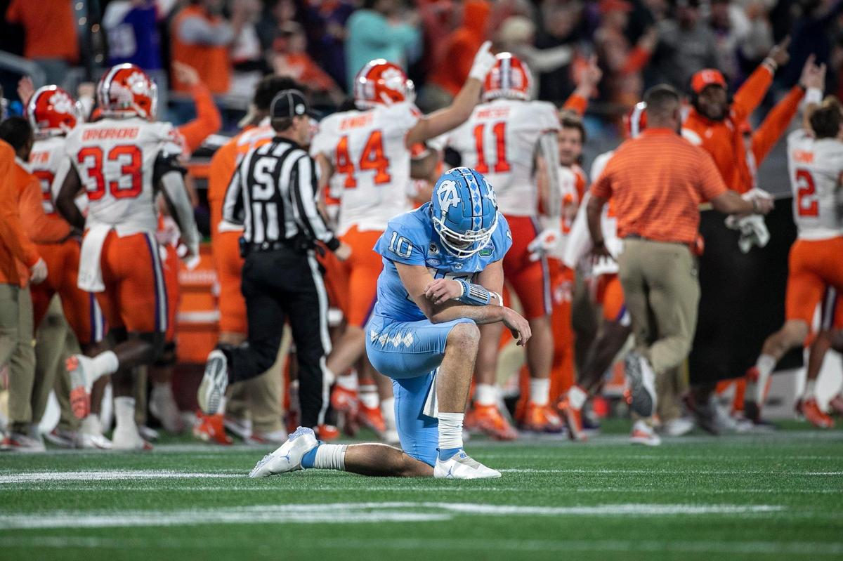 North Carolina quarterback Drake Maye (10) reacts after being intercepted by Clemson’s Nate Wiggins, who returned the ball for a touchdown in the third quarter, during the ACC Championship game on Saturday, December 3, 2022 at Bank of American Stadium in Charlotte, N.C.