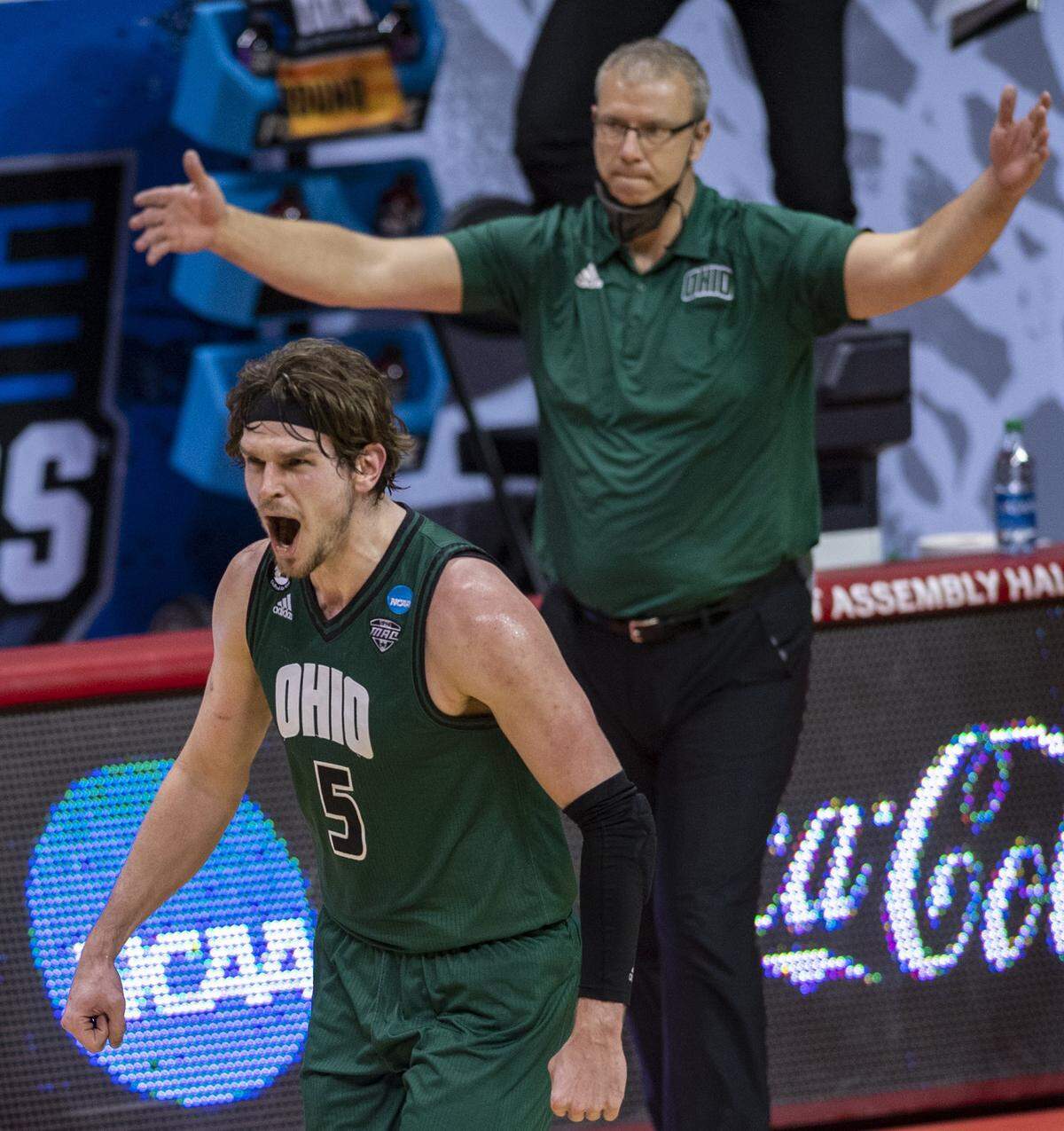 Ohio forward Ben Vander Plas (5) reacts after hitting a three-point basket to give the team their first over Virginia during the second half of a first-round game in the NCAA men’s college basketball tournament, Saturday, March 20, 2021, at Assembly Hall in Bloomington, Ind.