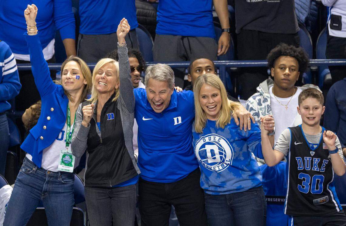 Duke coach Jon Scheyer’s family from left, wife Marcelle Scheyer, mother Laury Scheyer, father Jim Scheyer, sister Brooke Scheyer and nephew Blake Resnick celebrate the Blue Devils ACC Tournament Championship victory over Virginia on Saturday, March 11, 2023 at the Greensboro Coliseum in Greensboro, N.C.