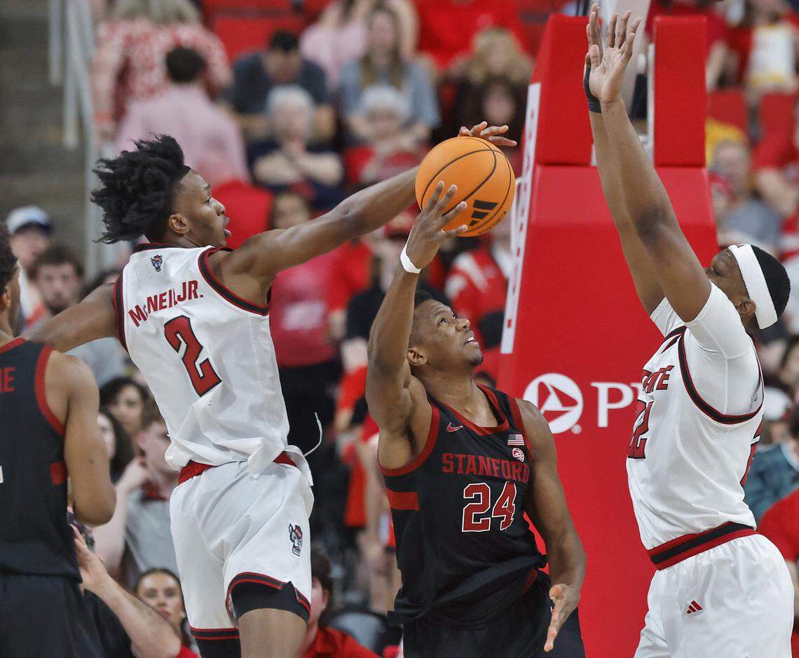 N.C. State's Paul McNeil Jr. blocks a shot by Stanford's Jaylen Thompson during the first half of the Wolfpack’s game on Saturday, March 7, 2026, at Lenovo Center in Raleigh, N.C.