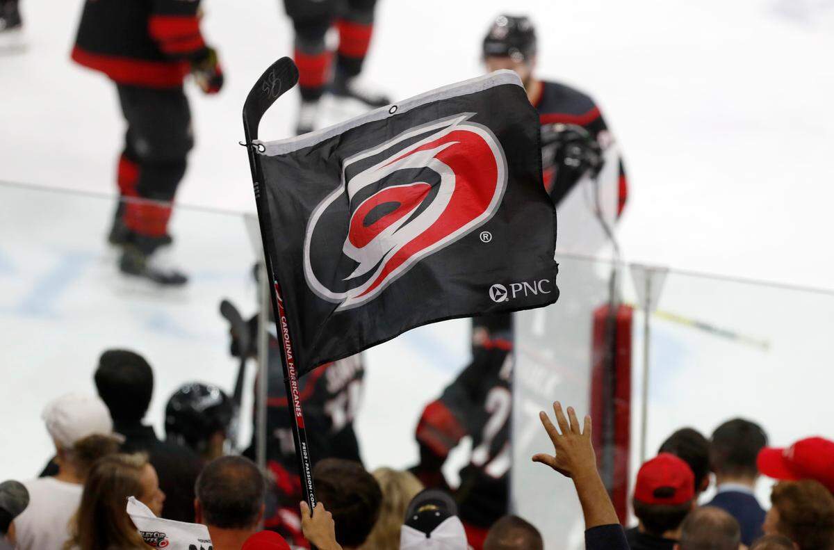 Canes fans cheer on the team during the second period of the Carolina Hurricanes’ game against the Boston Bruins in game four of the Eastern Conference finals at PNC Arena in Raleigh, N.C. Thursday, May 16, 2019.