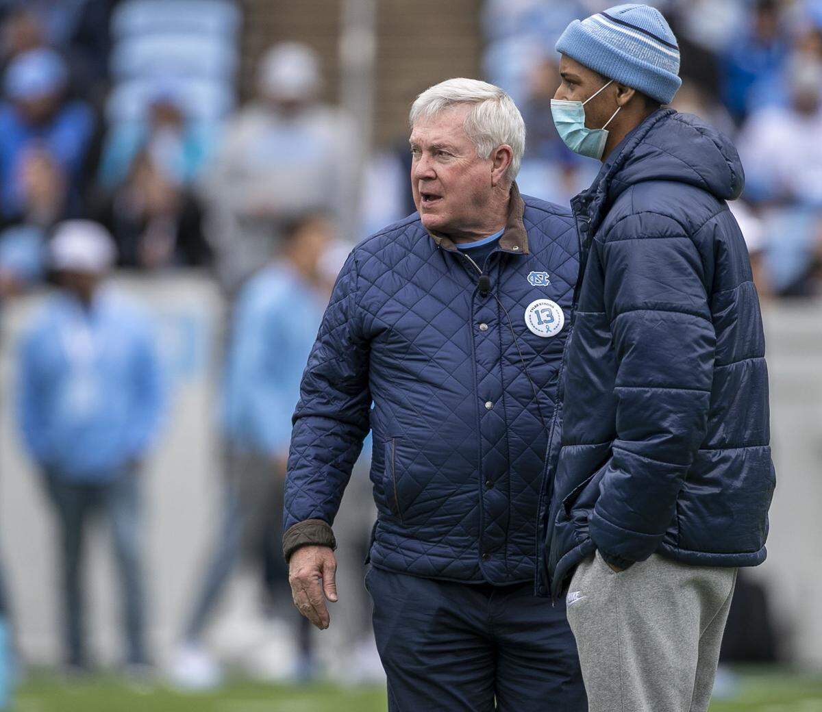 North Carolina coach Mack Brown talks with wide receiver Tylee Craft, who was recently diagnosed with a rare form of cancer, prior to the Tar Heels’ spring football game on Saturday, April 9, 2022 at Kenan Stadium in Chapel Hill, N.C. The spring game was named in Tylee’s honor.