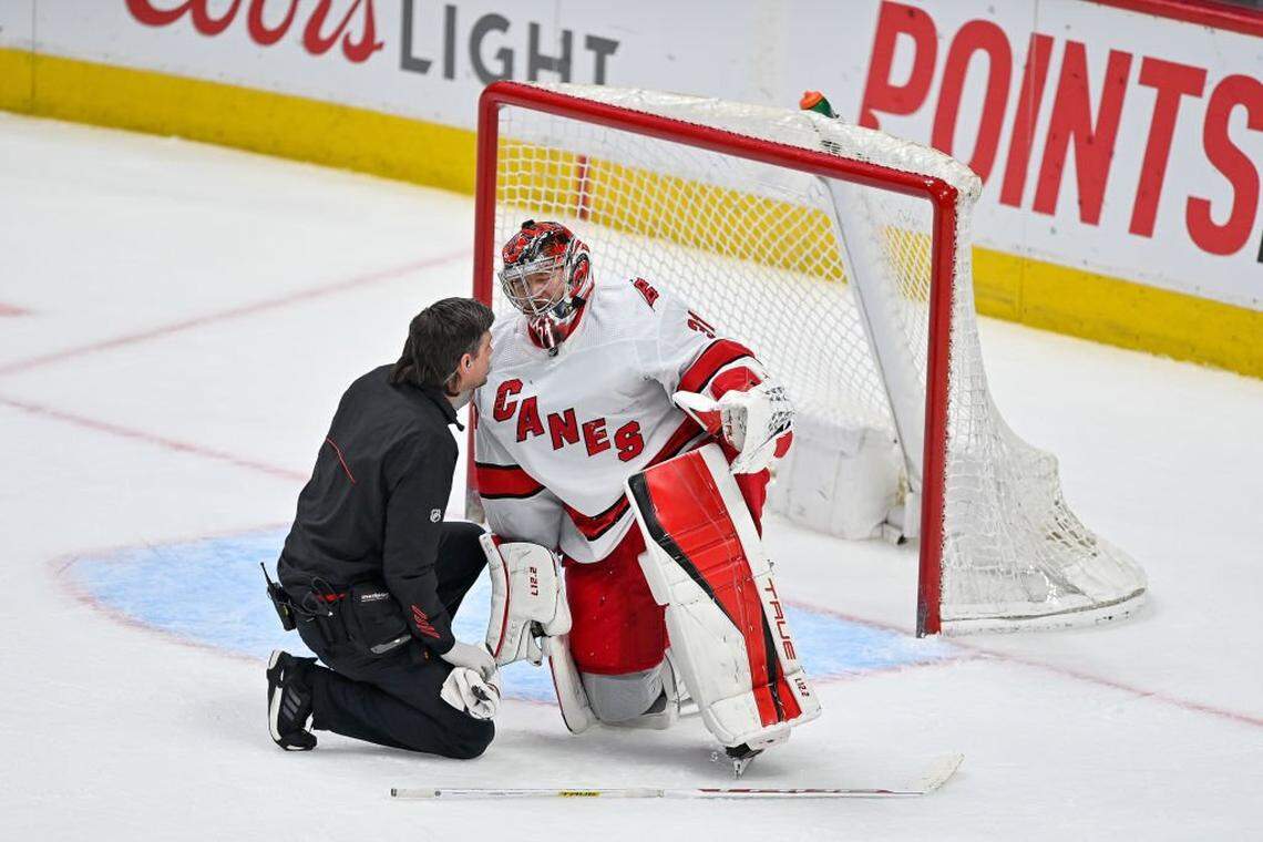 Frederik Andersen #31 of the Carolina Hurricanes appears to sustain an injury in the third period of a game against the Colorado Avalanche at Ball Arena on April 16, 2022 in Denver, Colorado.