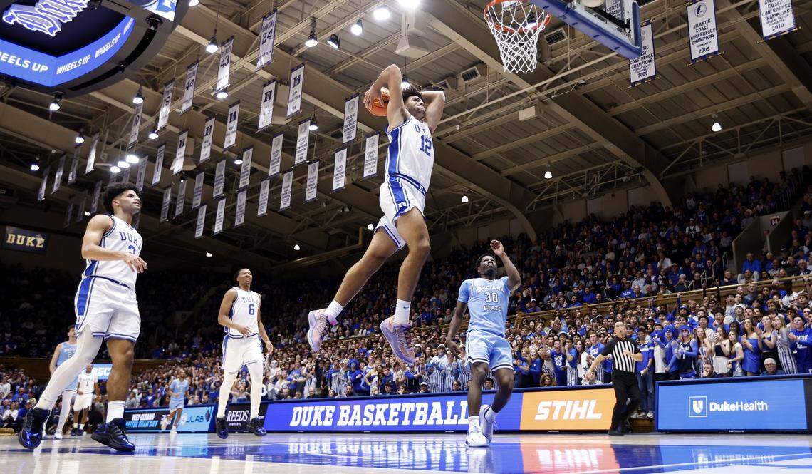 Duke’s Cameron Boozer (12) heads in to slam in two during the first half of Duke’s game against Indiana State at Cameron Indoor Stadium in Durham, N.C., Friday, Nov. 14, 2025.
