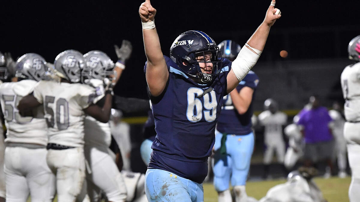 Willow Spring’s Logan Perdue (69) celebrates his tem’s victory after the second missed field goal attempt by South garner at the end of the fourth quarter. The Willow Spring Storm and the South Garner Titans met in a football game in Fuquay-Varina. N.C. on October 18, 2024.