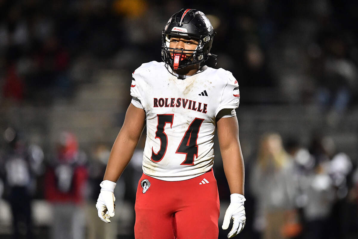 Rolesville defensive lineman Malachi Harris looks to the sidelines between plays against Rolesville during the first half. The Apex Friendship Patriots and the Rolesville Rams met in the second round of the NCHSAA 8A Playoff game in Apex, N.C. on Nov. 14, 2025.