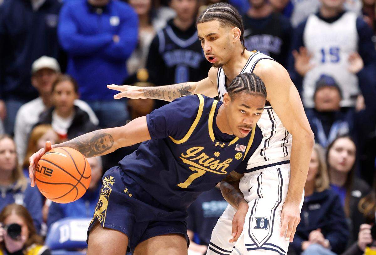 Duke’s Tyrese Proctor (5) defends Notre Dame’s Tae Davis (7) during the first half of Duke’s game against Notre Dame at Cameron Indoor Stadium in Durham, N.C., Saturday, Jan. 11, 2025.