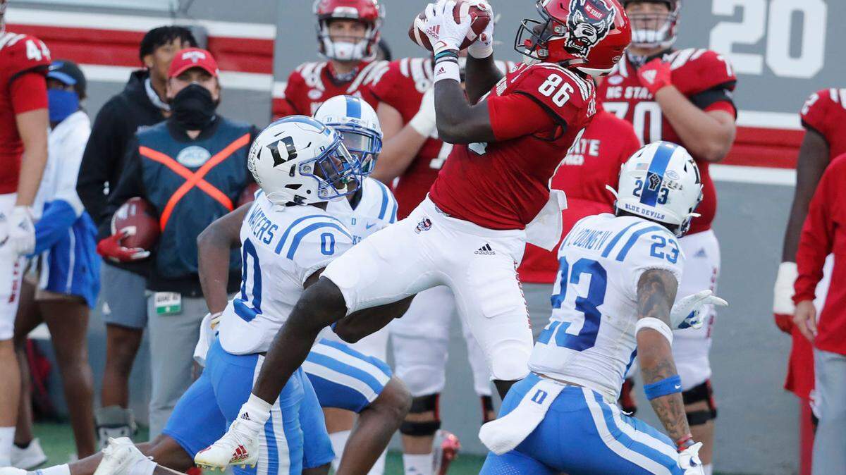 N.C. State wide receiver Emeka Emezie (86) pulls in the reception as Duke safety Marquis Waters (0) defends during the first half of N.C. State’s game against Duke at Carter-Finley Stadium in Raleigh, N.C., Saturday, Oct. 17, 2020.