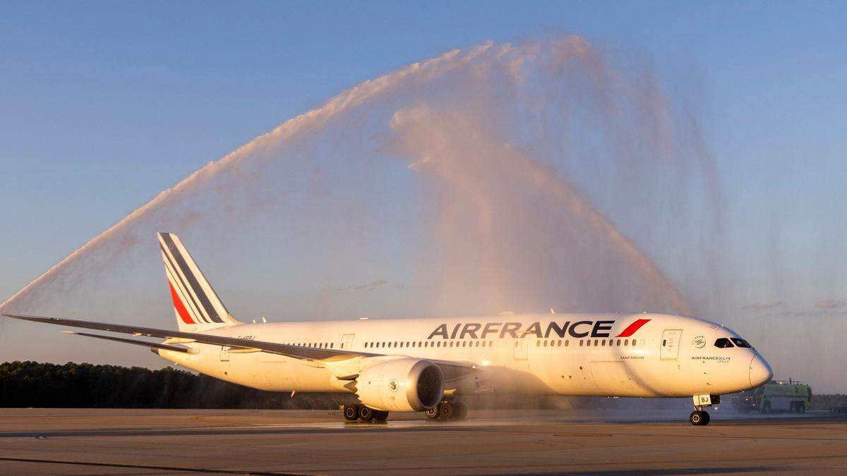 The first Air France flight from Paris at Raleigh-Durham International Airport taxis under water cannon spray after landing Monday afternoon, Oct. 30, 2023. Paris is one of eight international destinations that airlines now serve from RDU, some of them seasonally.