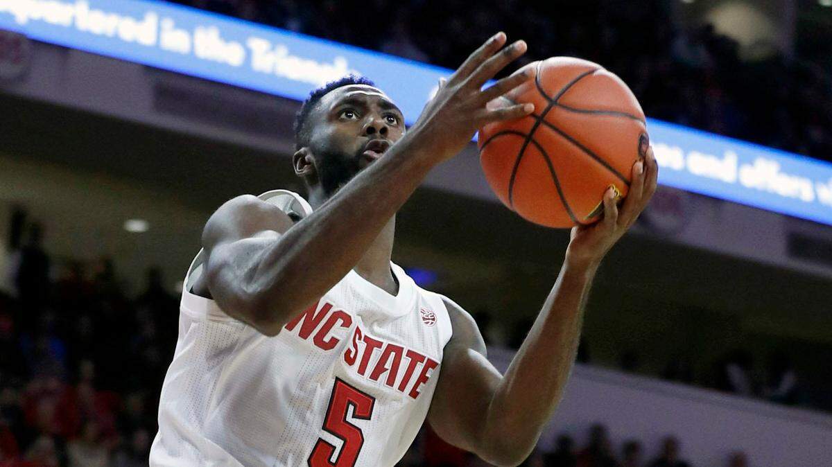 N.C. State’s Eric Lockett (5) drives to the basket during the second half of N.C. State’s 86-80 victory over Pittsburgh at PNC Arena in Raleigh, N.C., Saturday, Jan. 12, 2019.