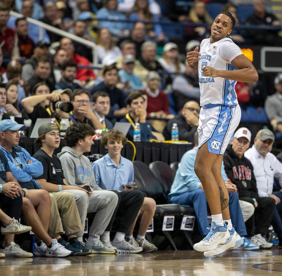 North Carolina’s Armando Bacot (5) hobbles to his feet after injuring himself in the first half against Boston College in the second round of the ACC Tournament on Wednesday, March 8, 2023 at the Greensboro Coliseum in Greensboro, N.C.