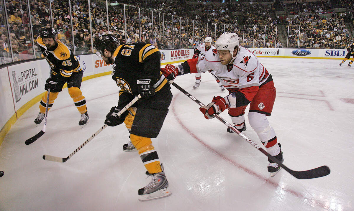 The Carolina Hurricanes’ Tim Gleason (6) battles the Boston Bruins’ Mark Stuart (45) and Phil Kessel (81) during first period action of Game 5 of an NHL playoff between the Carolina Hurricanes and the Boston Bruins at the TD Banknorth Garden in Boston, MA, Sunday May 10, 2009. Boston beat Carolina 4-0 to tighten the best-of-seven series at 3-2, Carolina. The next game is Tuesday, May 12 in Raleigh. staff/Chris Seward chris.seward@newsobserver.com