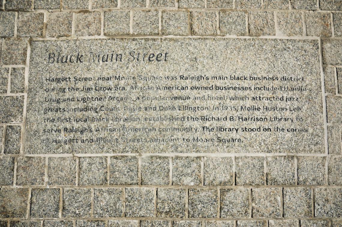 A marker notes the relationship between the African American community in South Park to the square and East Hargett Street, once known as Raleigh’s Black Main Street.
