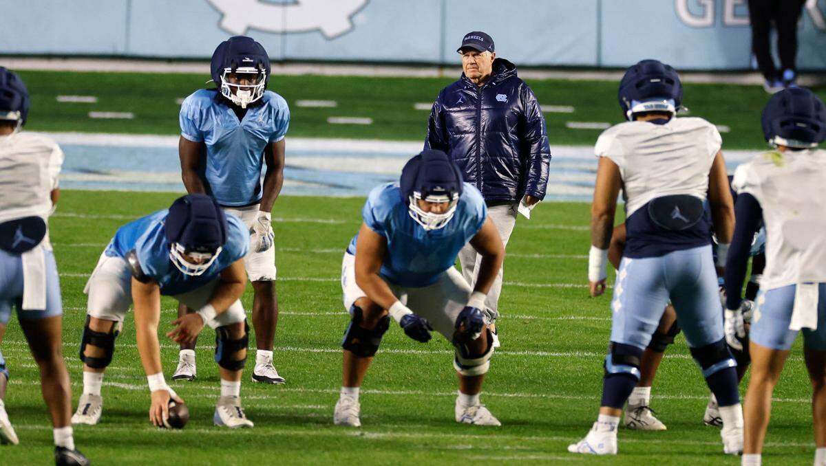 North Carolina head football coach Bill Belichick watches play during UNC footballÕs Practice Like a Pro open practice at Kenan Stadium in Chapel Hill, N.C., Saturday, April 12, 2025.
