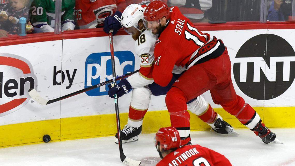 Carolina center Jordan Staal (11) works against Florida defenseman Marc Staal (18) during the first period of the Hurricanes’ game against the Panthers in the first game of Eastern Conference Finals at PNC Arena in Raleigh, N.C., on Thursday, May 18, 2023.