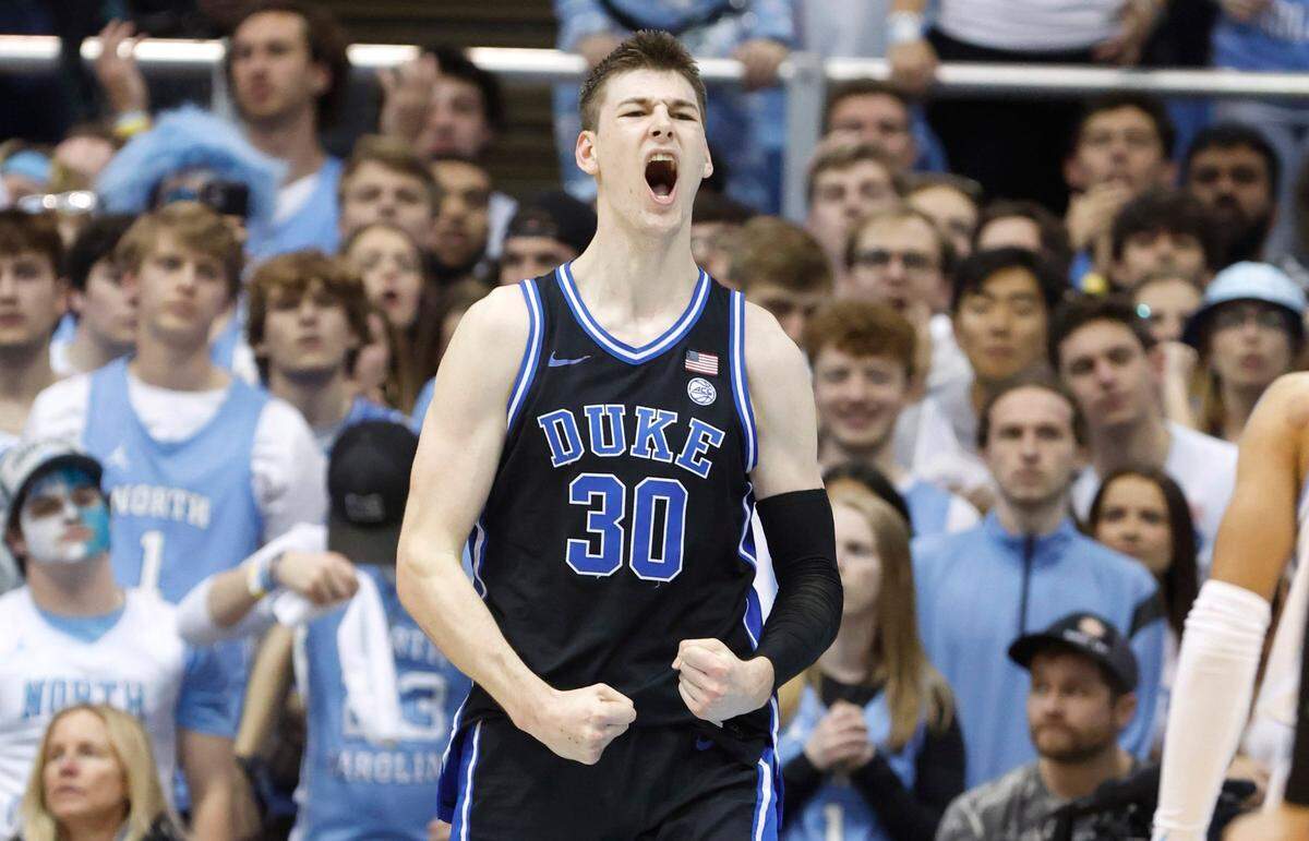 Duke’s Kyle Filipowski (30) celebrates after making the basket while being fouled during the first half of UNC’s game against Duke at the Smith Center in Chapel Hill, N.C., Saturday, March 4, 2023.