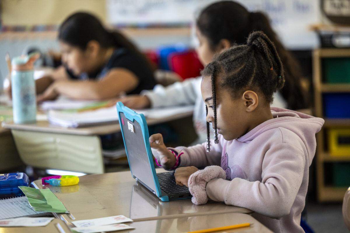 Aversboro Road Elementary students uses a laptop Thursday, April 30, 2026, at Aversboro Elementary School in Garner.