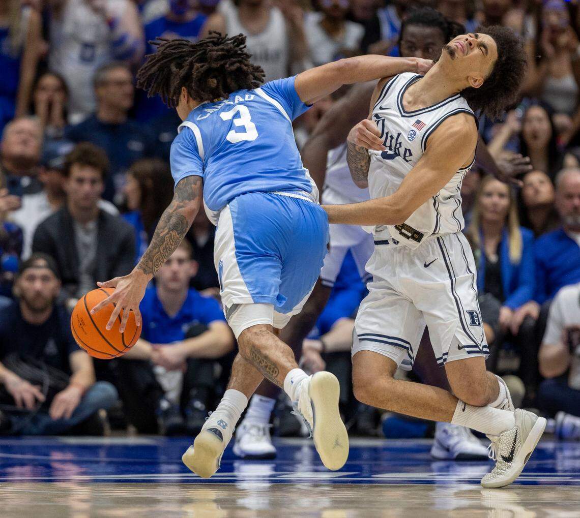 North Carolina guard Elliot Cadeau (3) is called for as flagrant foul on this play against Duke guard Tyrese Proctor (5) in the first half on Saturday, February 1, 2025 at Cameron Indoor Stadium in Durham, N.C.
