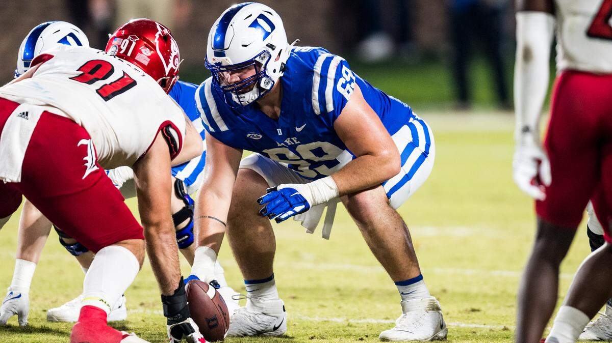 Kade Parmelly (69) lines up a center during a Duke football game against Louisville at Wallace Wade Stadium on November 18, 2021, in Durham, North Carolina.
