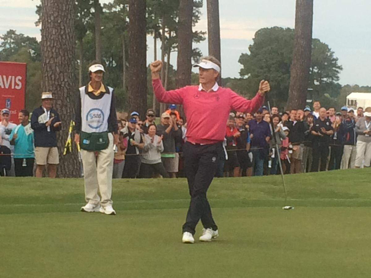 Bernhard Langer celebrates his record-setting win at the SAS Championship on Sunday, breaking the tournament record for lowest score (22-under par). Langer also won the SAS in 2012.