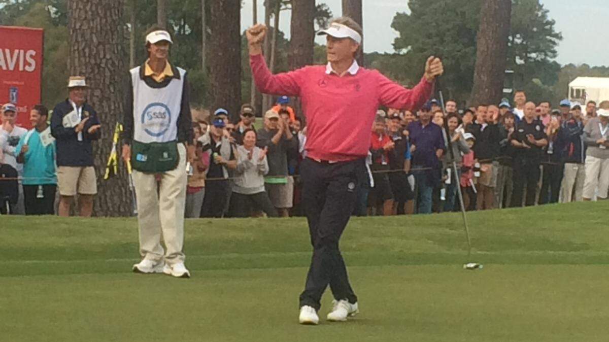 Bernhard Langer celebrates his record-setting win at the SAS Championship on Sunday, breaking the tournament record for lowest score (22-under par). Langer also won the SAS in 2012.