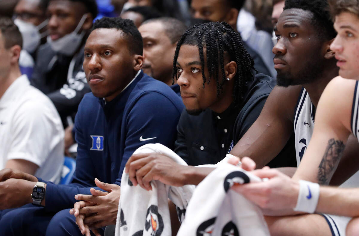 Duke’s Trevor Keels watches from the bench during the second half of Duke’s 79-59 victory over Syracuse at Cameron Indoor Stadium in Durham, N.C., Saturday, Jan. 22, 2022.