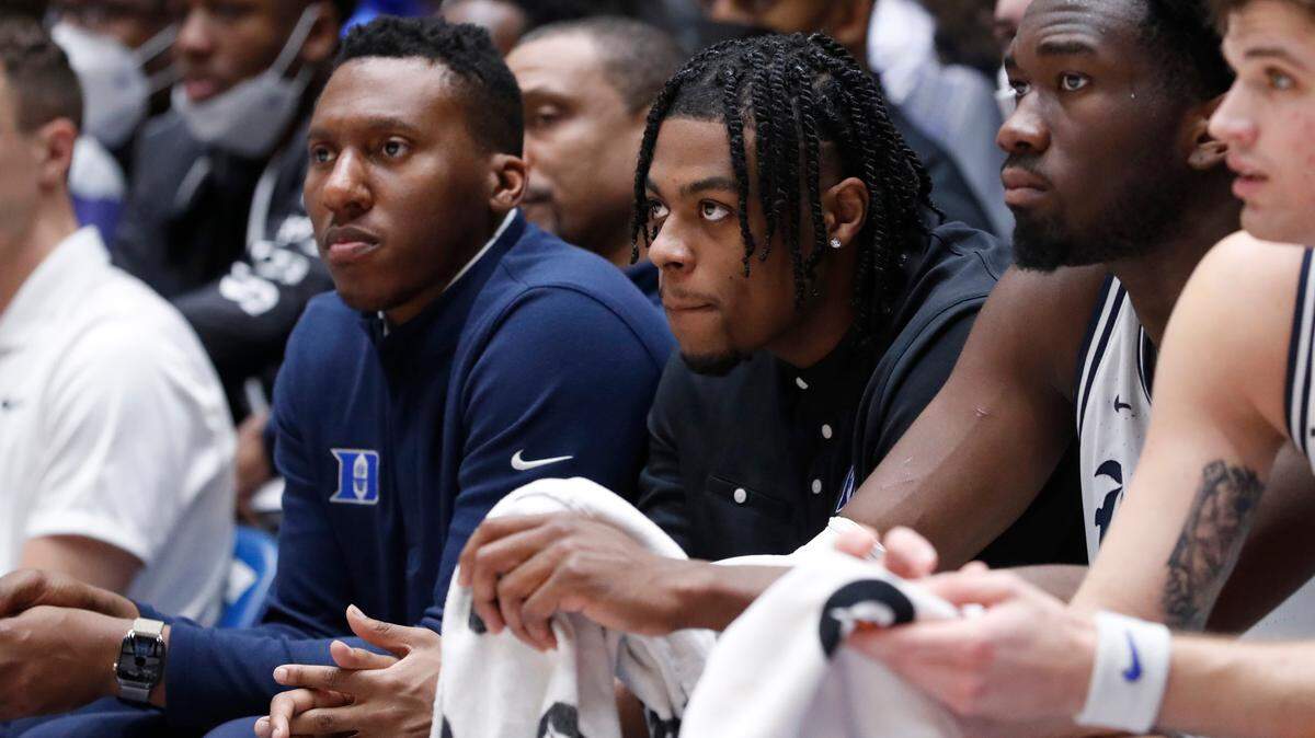 Duke’s Trevor Keels watches from the bench during the second half of Duke’s 79-59 victory over Syracuse at Cameron Indoor Stadium in Durham, N.C., Saturday, Jan. 22, 2022.