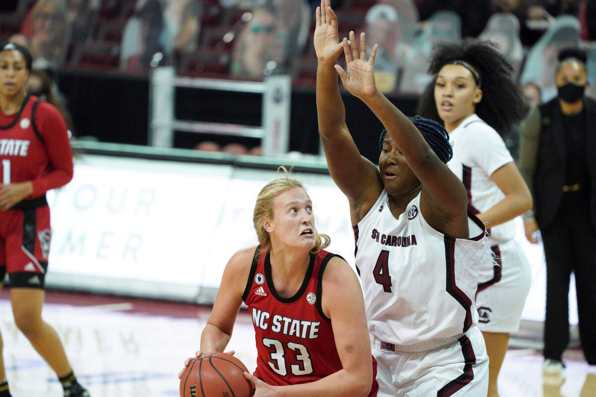 North Carolina State center Elissa Cunane (33) looks for a shot against South Carolina forward Aliyah Boston (4) during the first half of an NCAA college basketball game Thursday, Dec. 3, 2020, in Columbia, S.C.