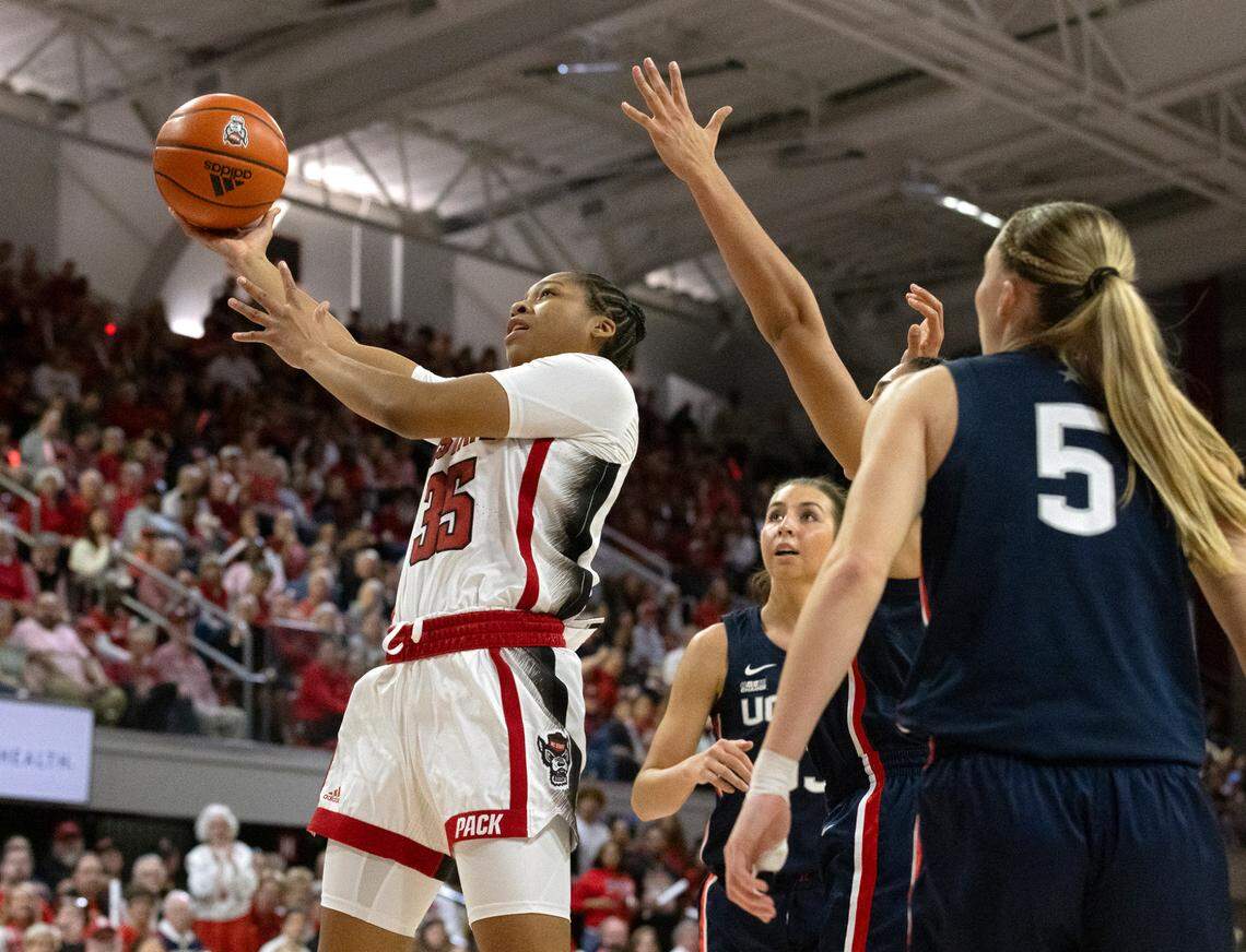N.C. State’s Zoe Brooks drives to the basket during the first half of the Wolfpack’s game against UConn on Sunday, Nov. 12, 2023, at Reynolds Coliseum in Raleigh, N.C.