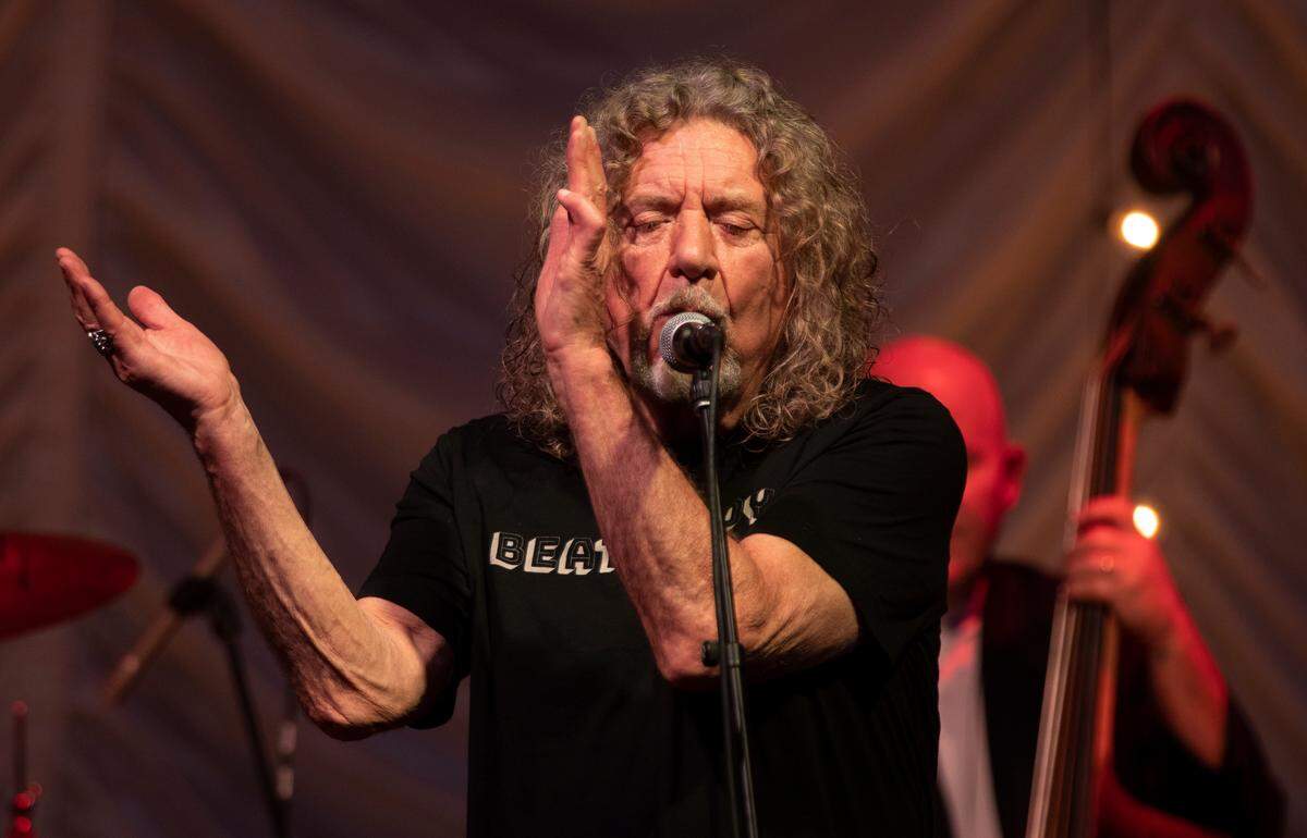Robert Plant and Alison Krauss in concert on their “Raise the Roof Tour” Tuesday night, June 14, at Cary, N.C.’s Koka Booth Amphitheatre.