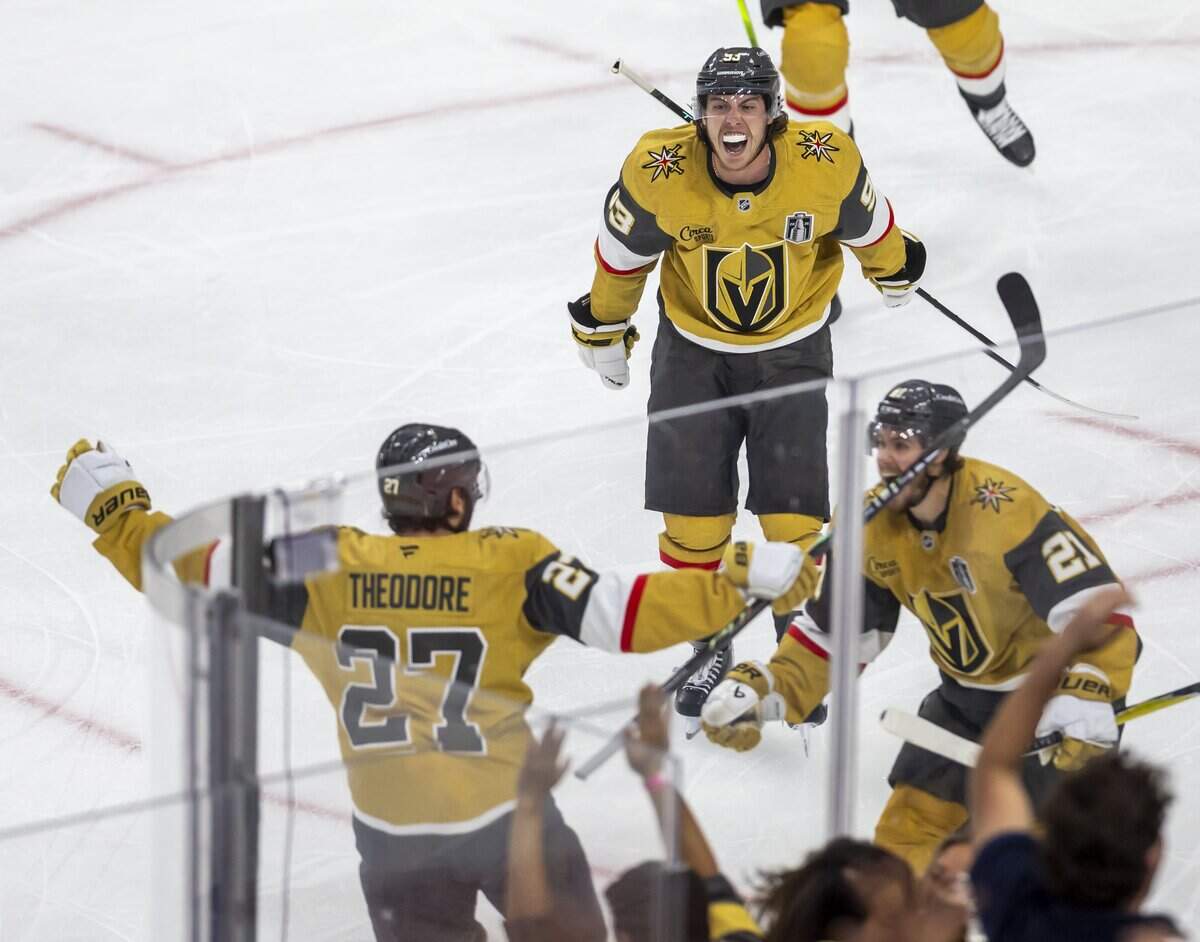 Vegas right wing Mitch Marner (93) celebrates with teammate defenseman Shea Theodore after Theodore’s goal in double over time secured a 5-4 victory over the Carolina Hurricanes in Game 3 of the Stanley Cup Final, on Saturday, June 6, 2026 at T-Mobile Arena in Las Vegas, NV.