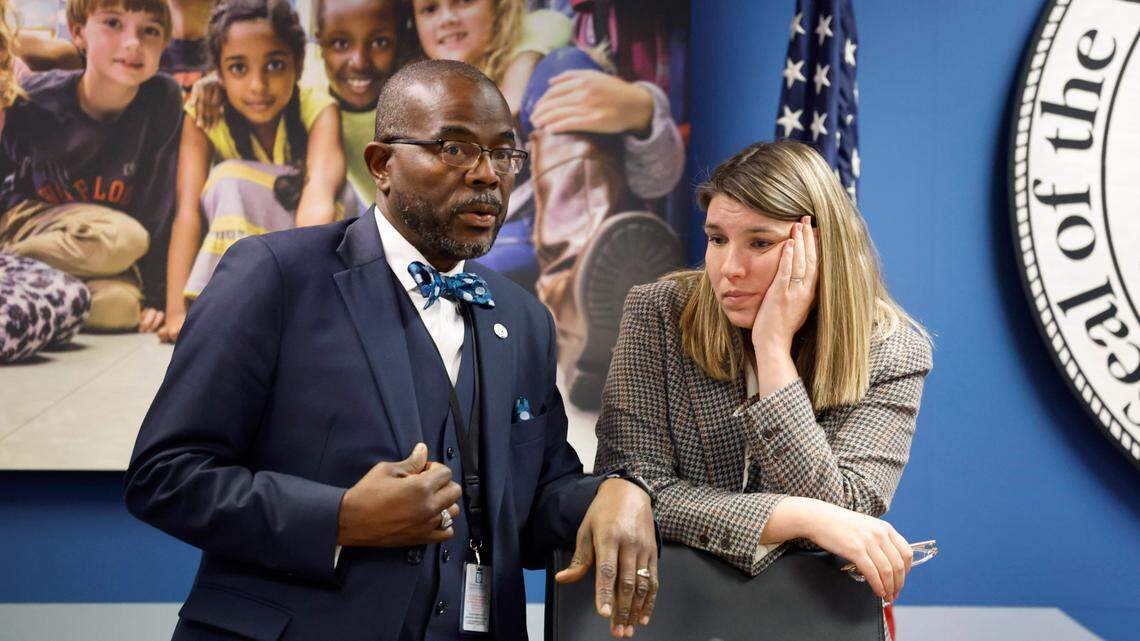 Wake County School Board chair Lindsay Mahaffey, right, talks with Superintendent Robert Taylor after the Wake County School Board Safety and Security meeting broke to go into closed session Tuesday, Nov. 28, 2023. The board will discuss in closed session the deadly fight at Southeast Raleigh High School Monday.