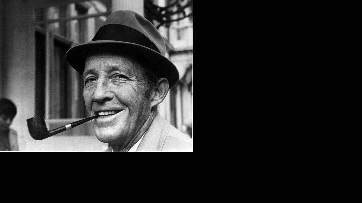 Bing Crosby with his signature hat and pipe in London, circa 1973. 
