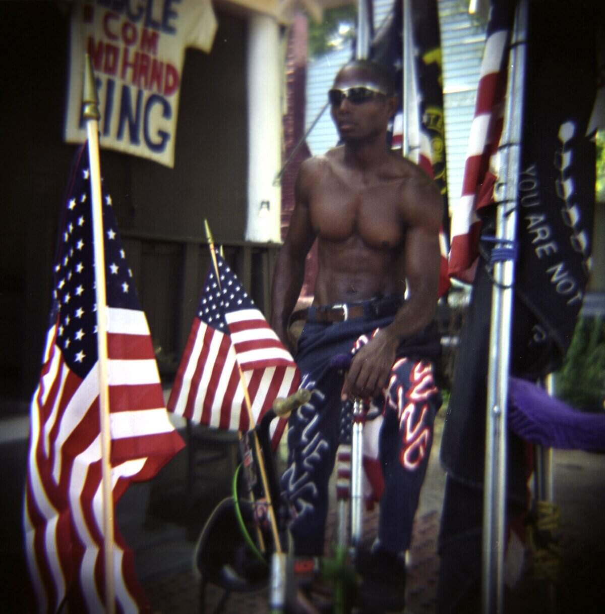 “I’m doing this in honor of the troops,” says the No Hand King, Rodney Hines, shown in this file photo with the American flag from all of his trick bikes in Raleigh.