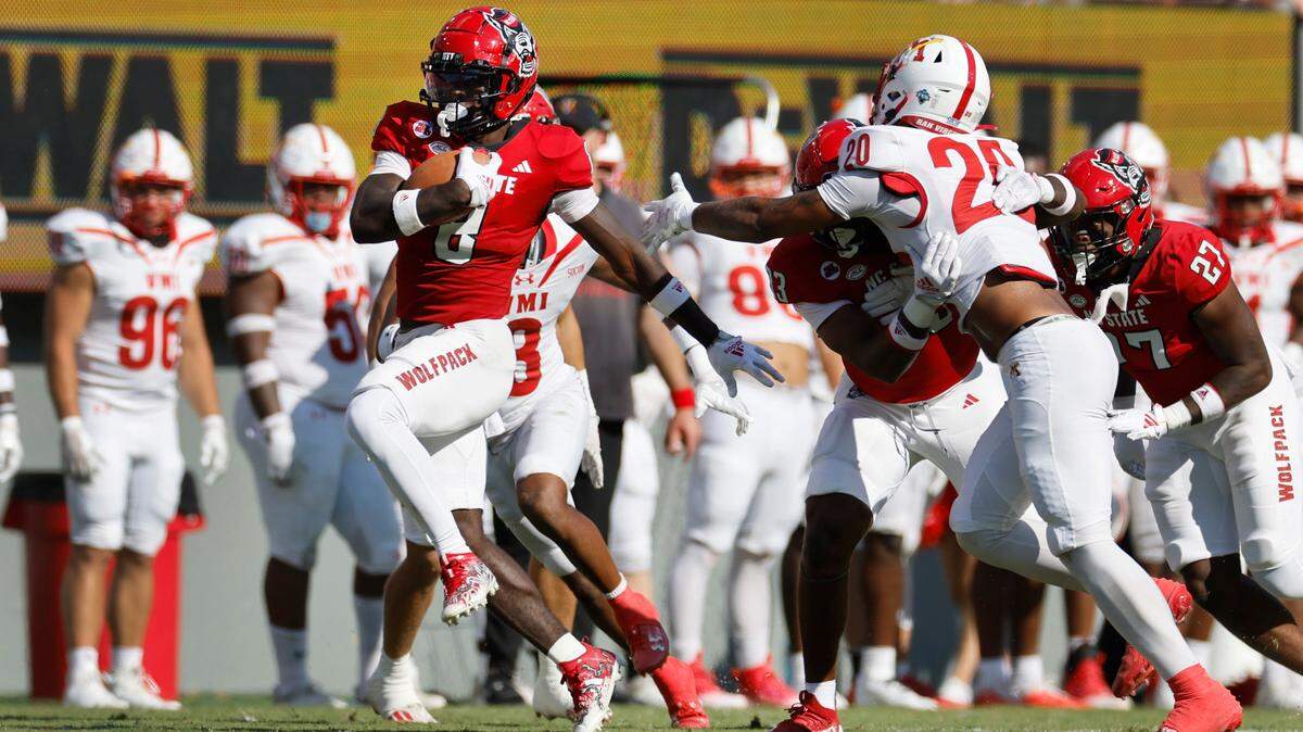 N.C. State’s Julian Gray (8) breaks free for a touchdown on a 82-yard kickoff return during the second half of the Wolfpack’s 45-7 victory over VMI at Carter-Finley Stadium in Raleigh, N.C., Saturday, Sept. 16, 2023.