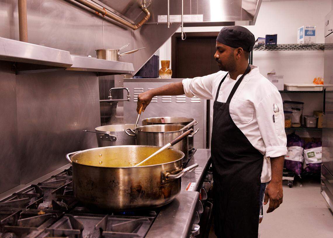 Manikandan works in the kitchen of Tamasha Modern Indian on Wednesday, May 8, 2024, in Raleigh, N.C.