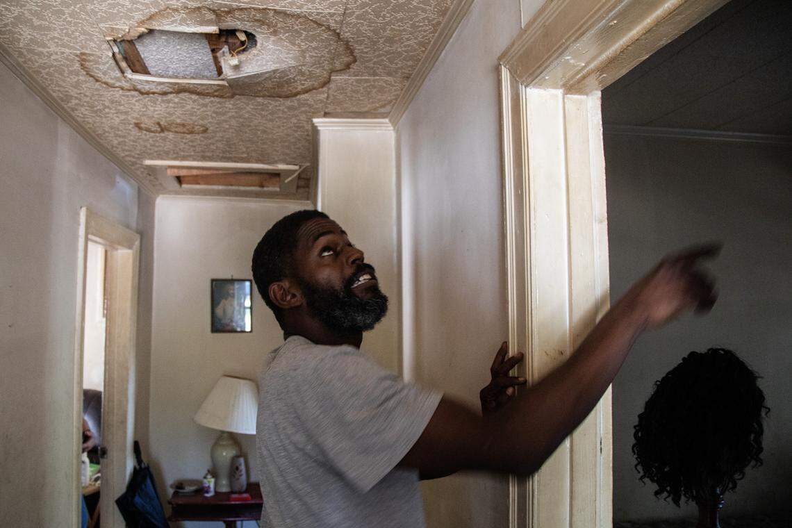 Robert Simmons Jr. points out water stains in his New Bern home Tuesday, Sept. 18, 2018. Simmons says that a federal grant to repair his home’s roof after Hurricane Isabel led to a shoddy roof repair.