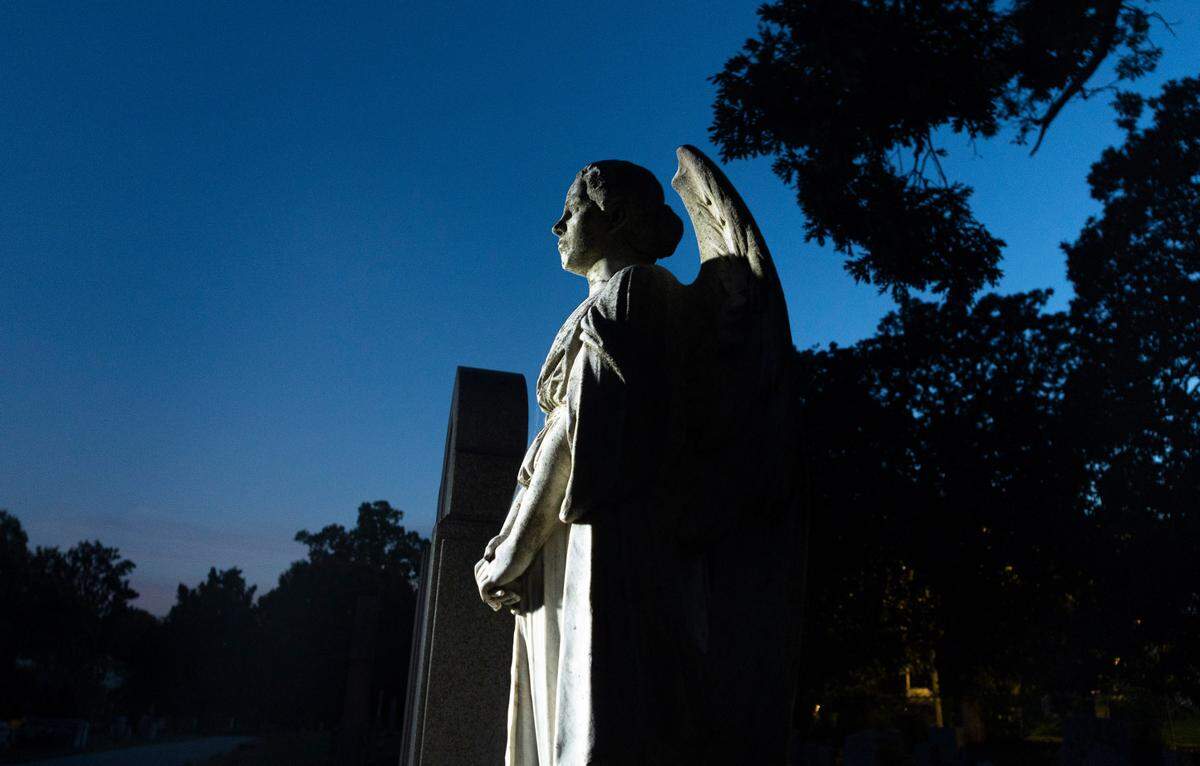 The Ratcliffe Angel in Raleigh’s Historic Oakwood Cemetery stands over the grave of Etta Rebecca White Ratcliffe. Photographed October 7, 2022.