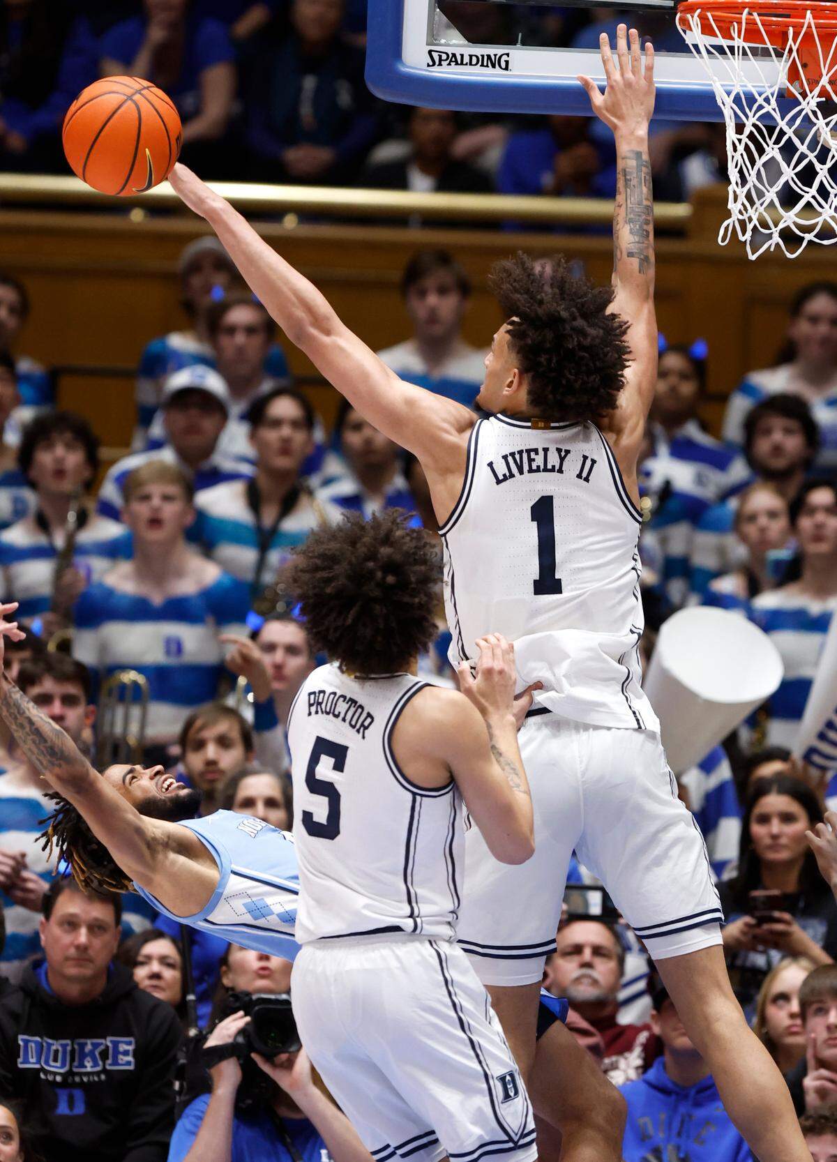 Duke’s Dereck Lively II (1) blocks the shot by North Carolina’s R.J. Davis (4) during the second half of Duke’s 63-57 victory over UNC at Cameron Indoor Stadium in Durham, N.C., Saturday, Feb. 4, 2023.