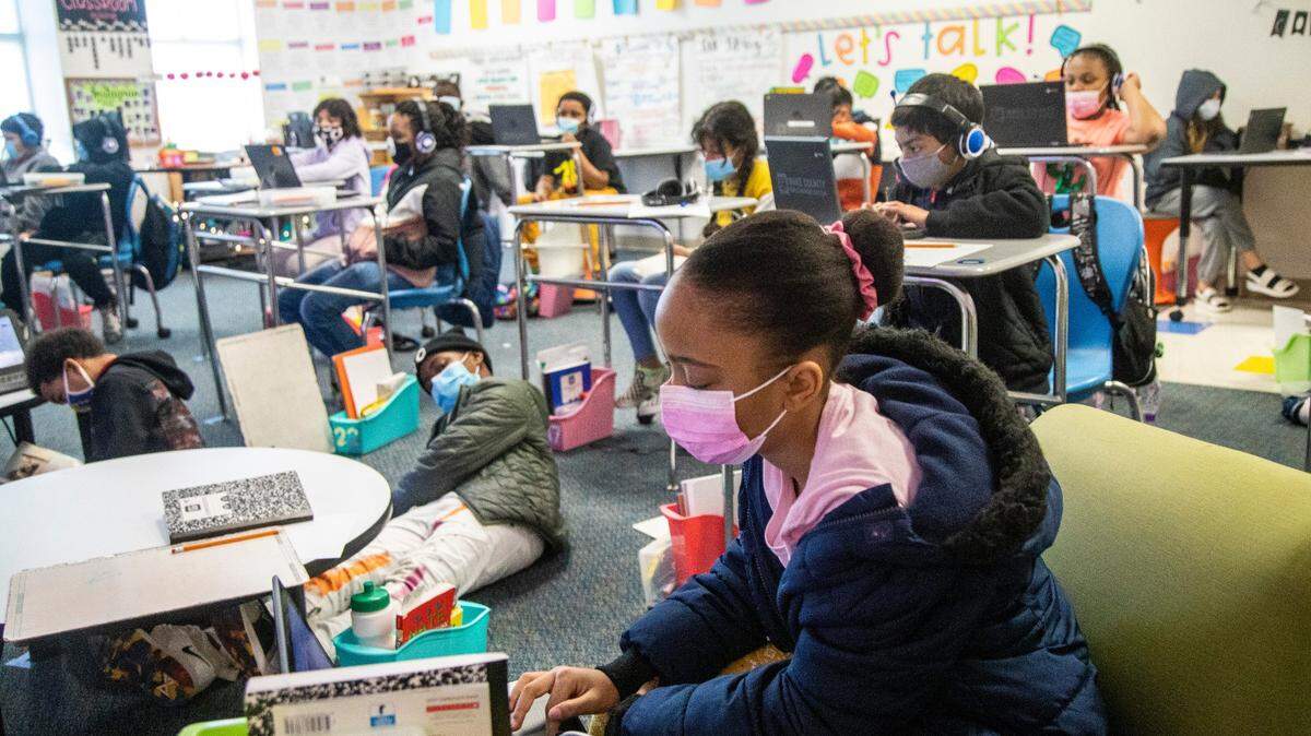 Fifth-graders in a crowded Raleigh classroom in March 2021. North Carolina lawmakers are headed for a legal showdown over a state budget that doesn’t include most a court-ordered plan to increase K-12 education spending. A N.C. Superior Court judge warned in a court order last month that he’d take action if legislators didn’t begin funding the plan.