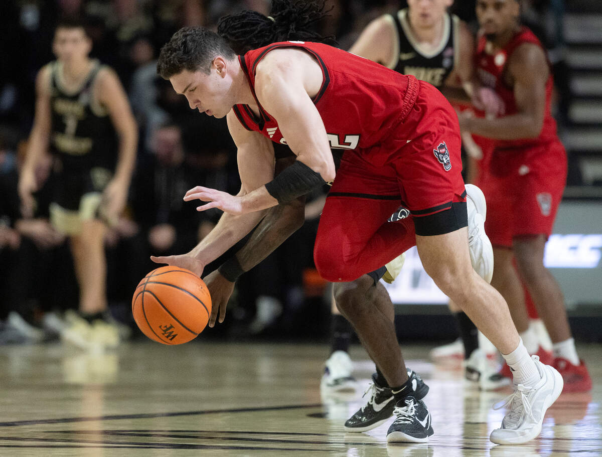 N.C. State’s Michael O’Connell forces a Wake Forest turnover during the second half of the Wolfpack’s 77-59 loss on Saturday, Jan. 4, 2025, at Lawrence Joel Veterans Memorial Coliseum in Winston-Salem, N.C.