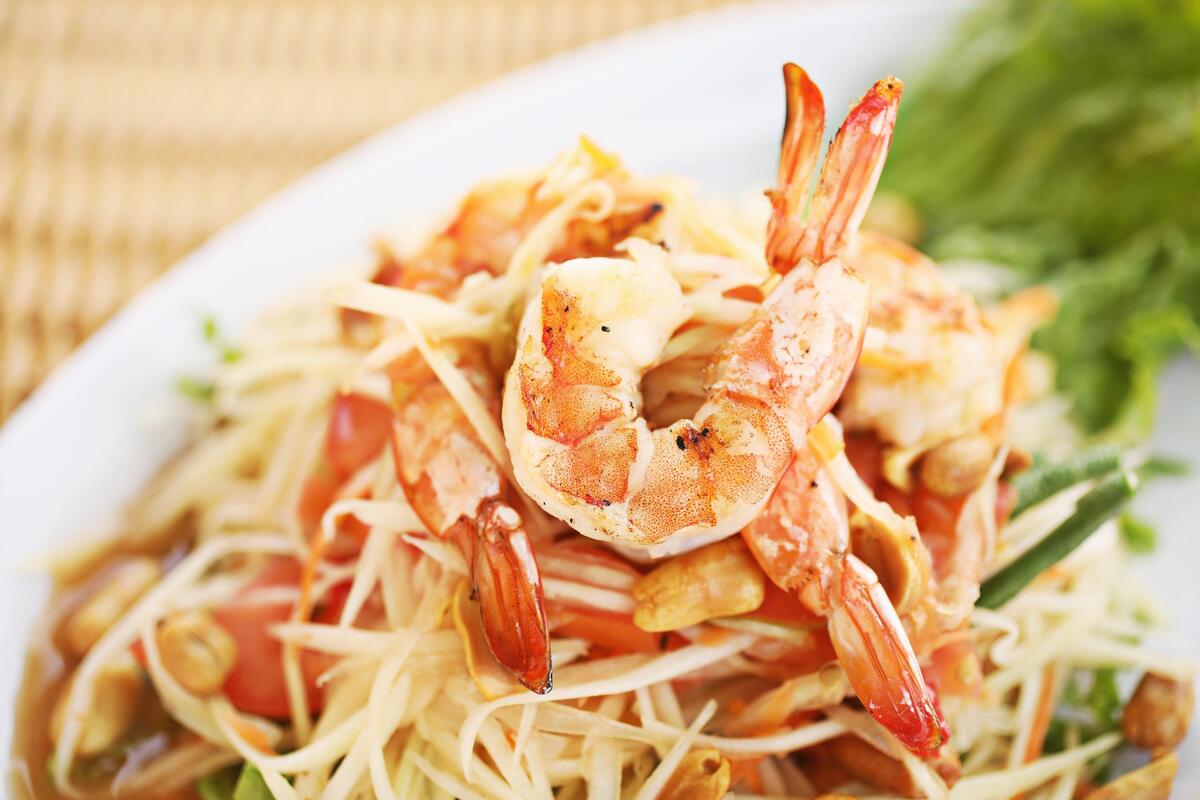 The goi du du is a colorful medley of julienne green papaya, haricots verts, tomatoes and cucumber in a dressing that leans toward fish sauce and is topped with toasted peanuts and your choice of shrimp, chicken or pork at Pho XO in Morrisville.