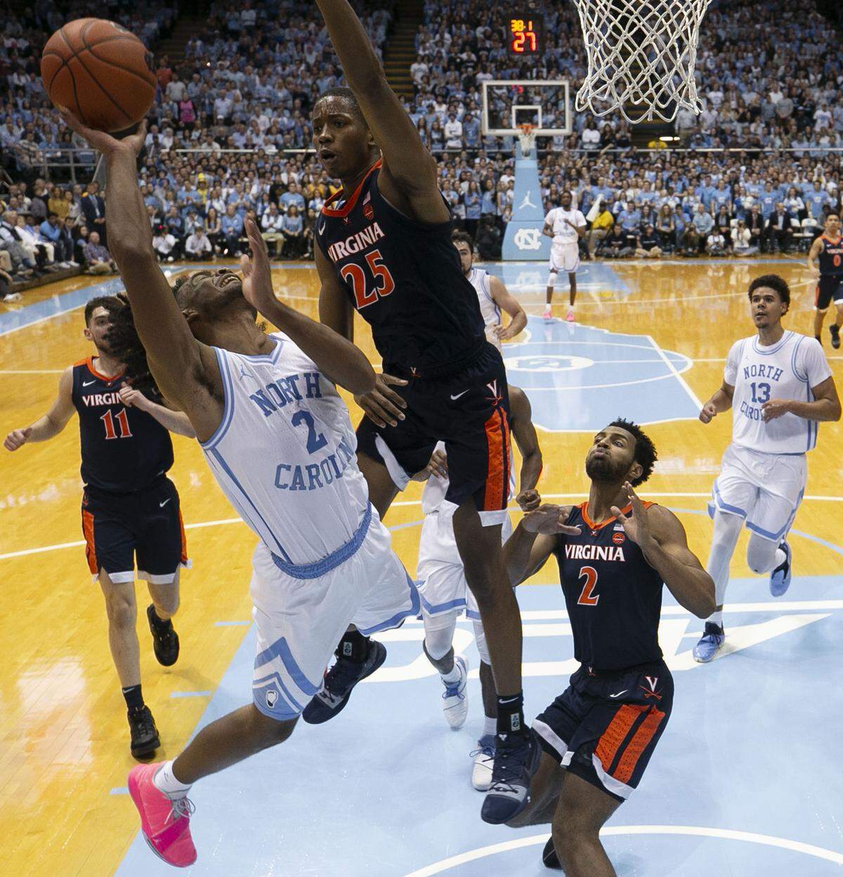 Virginia’s Mamadi Diakite (25) defends North Carolina’s Coby White (2) during the first half on Monday, February 11, 2019 at the Smith Center in Chapel Hill, N.C.