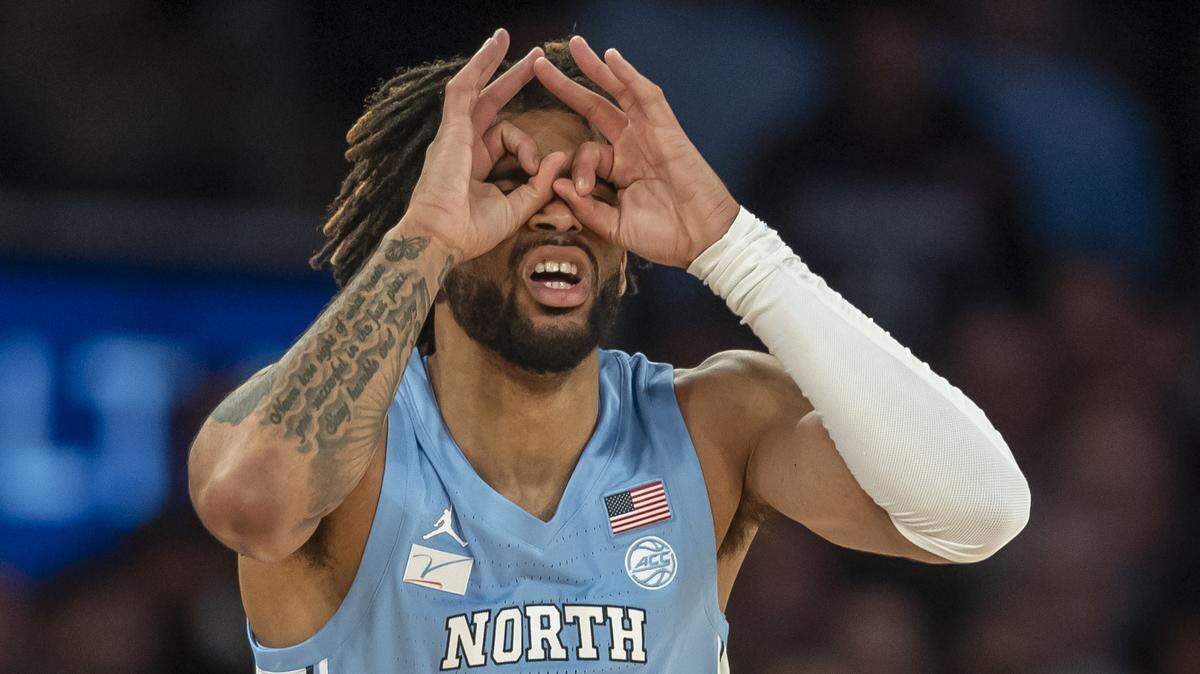 North Carolina’s R.J. Davis (4) reacts after sinking a three-point basket against Connecticut during the first half in the Jimmy V Classic on Tuesday, December 5, 2023 at Madison Square Garden in New York, NY.
