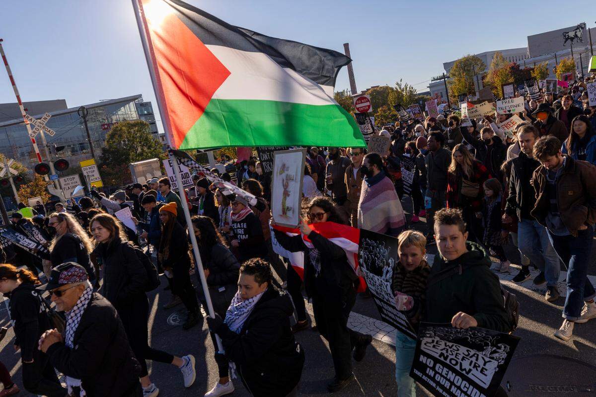 Protesters march in downtown Durham Thursday evening, Nov. 2, 2023 demanding a ceasefire in the Israel-Gaza War.